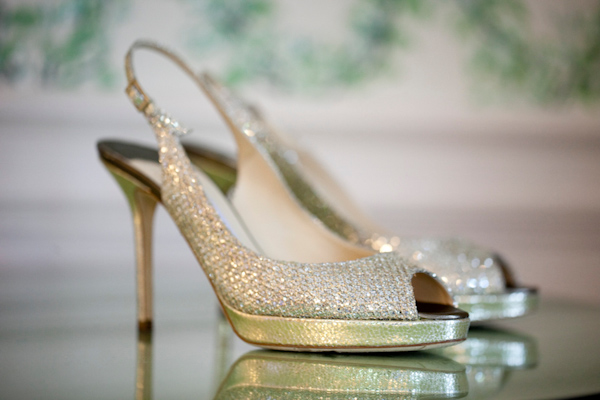 a pair of beautiful gold and silver sequin peek-a-boo toe heels - photo by Washington DC wedding photojournalist Paul Morse